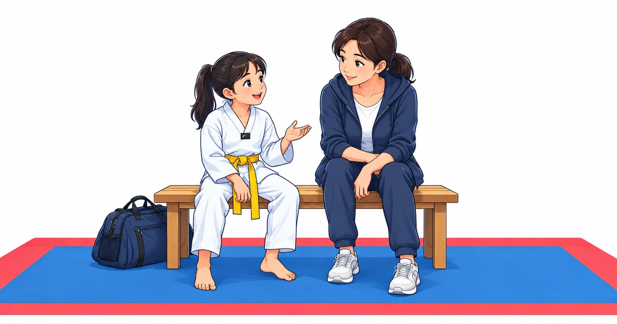 Ein Mädchen im Dobok spricht auf einer Bank mit seiner aufmerksam zuhörenden Mutter.
